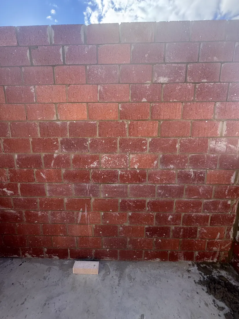 Red brick wall close-up