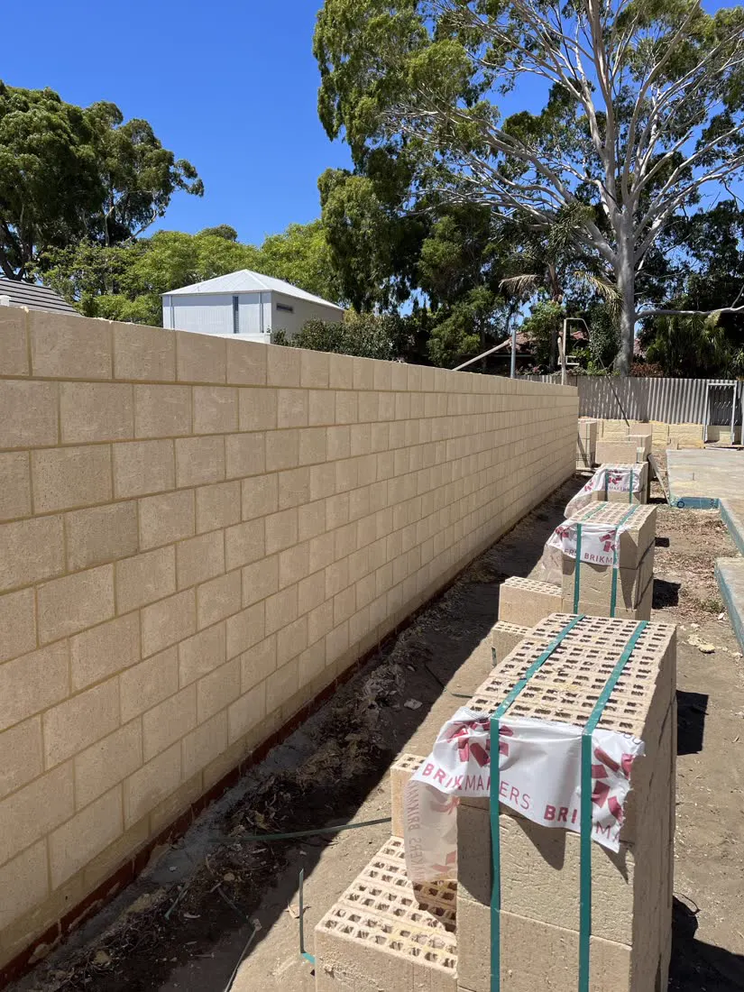 Limestone-look brick boundary wall
