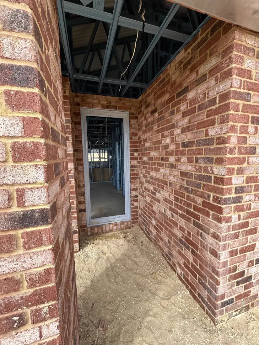 Red brick entry porch brickwork