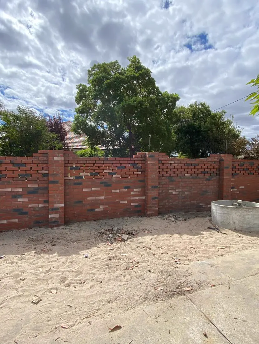 Red brick feature boundary wall